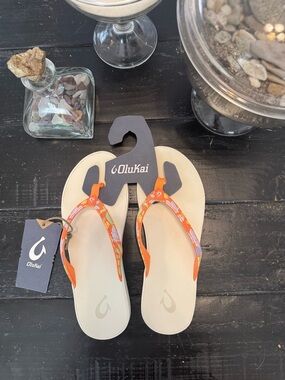 OluKai Women's Floral Sandal with Orange Trim